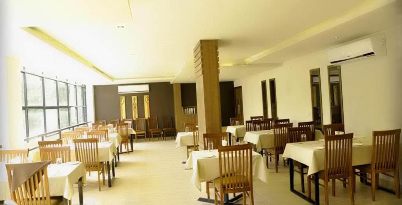 Hotel Monarch Кожикоде Экстерьер фото
